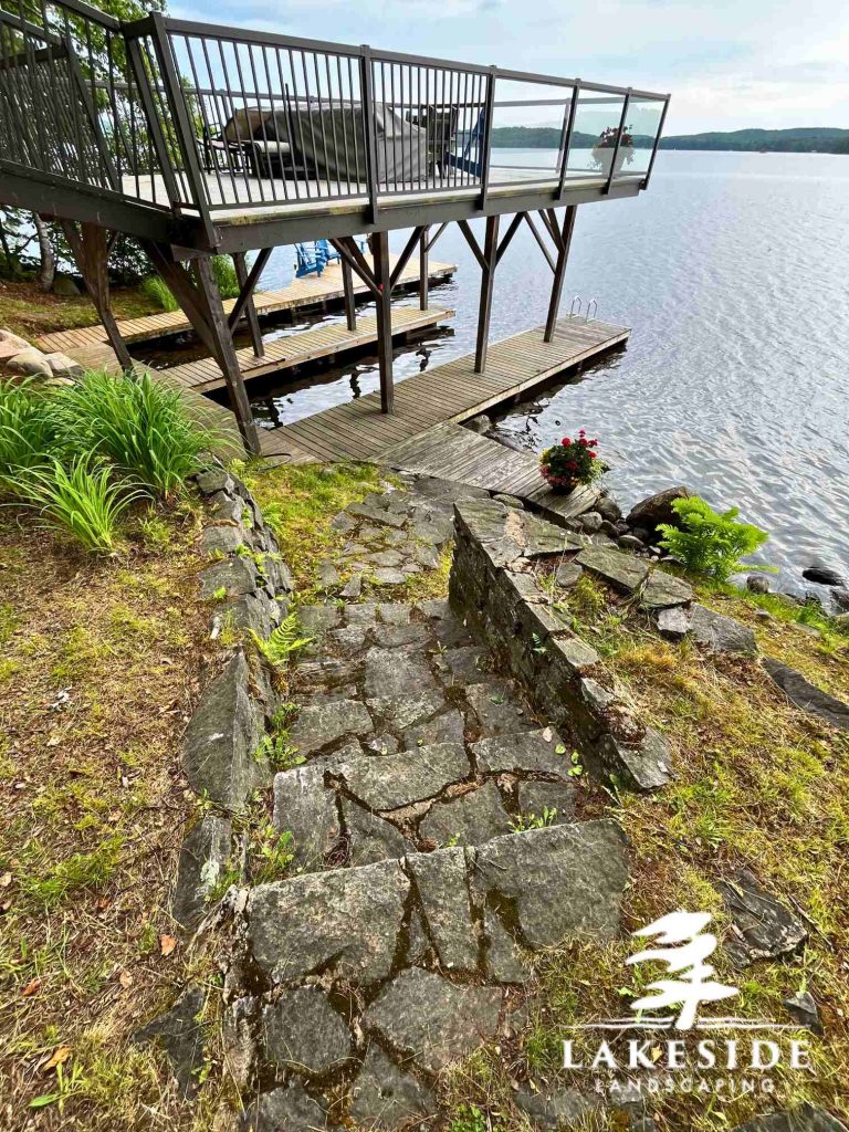 Stone landscpaing down to a Muskoka area dock