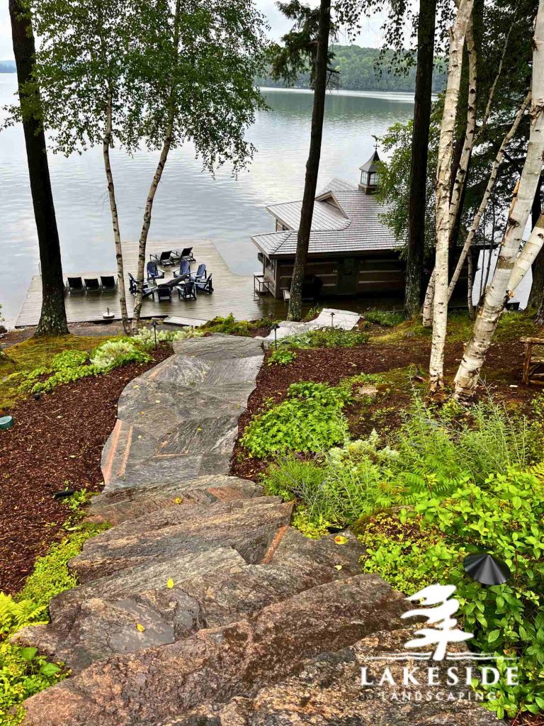 Stone pathway and steps down to the waterfront in the Muskoka